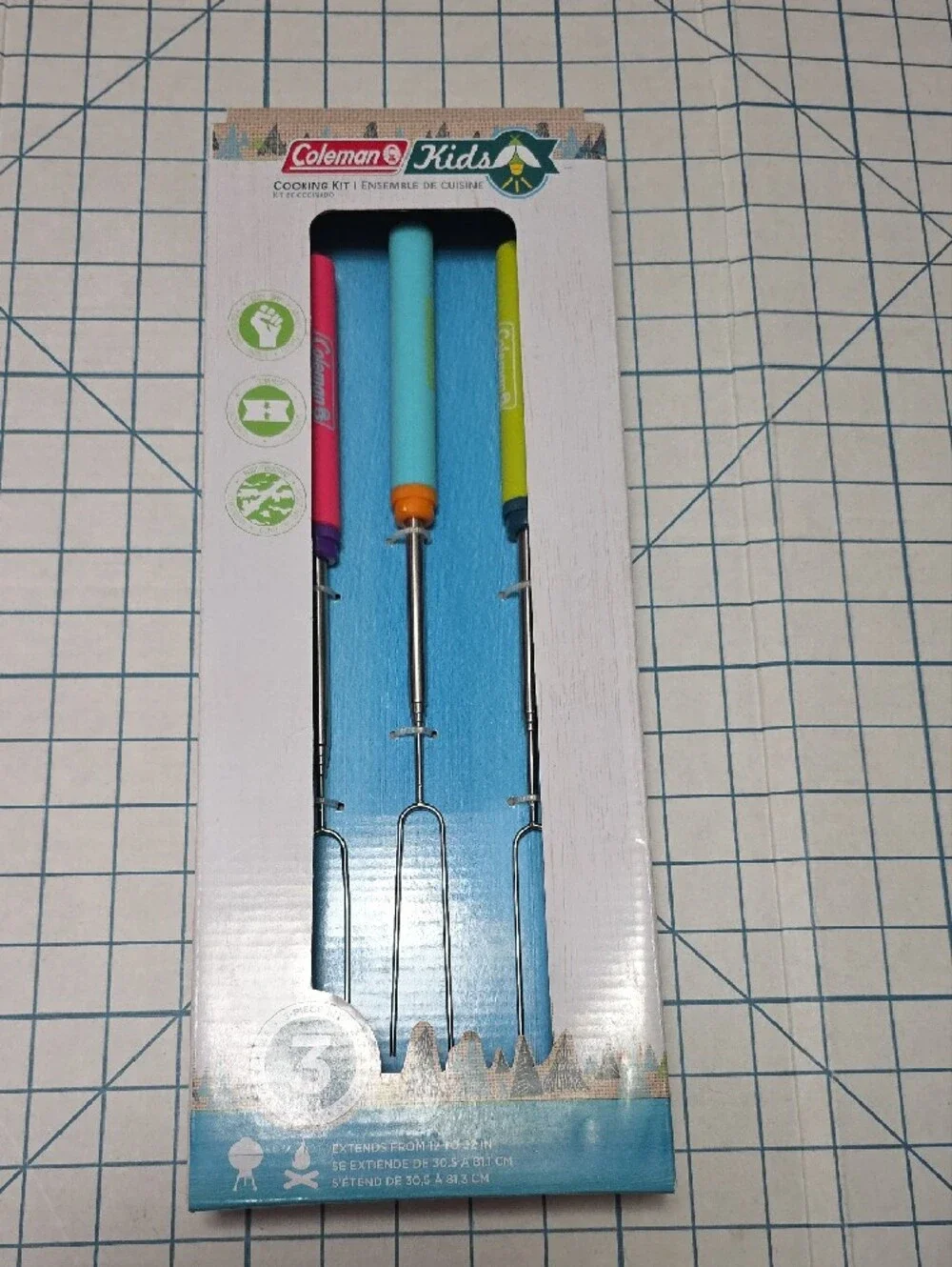 Coleman Kids roasting forks with pink, teal, yellow handles